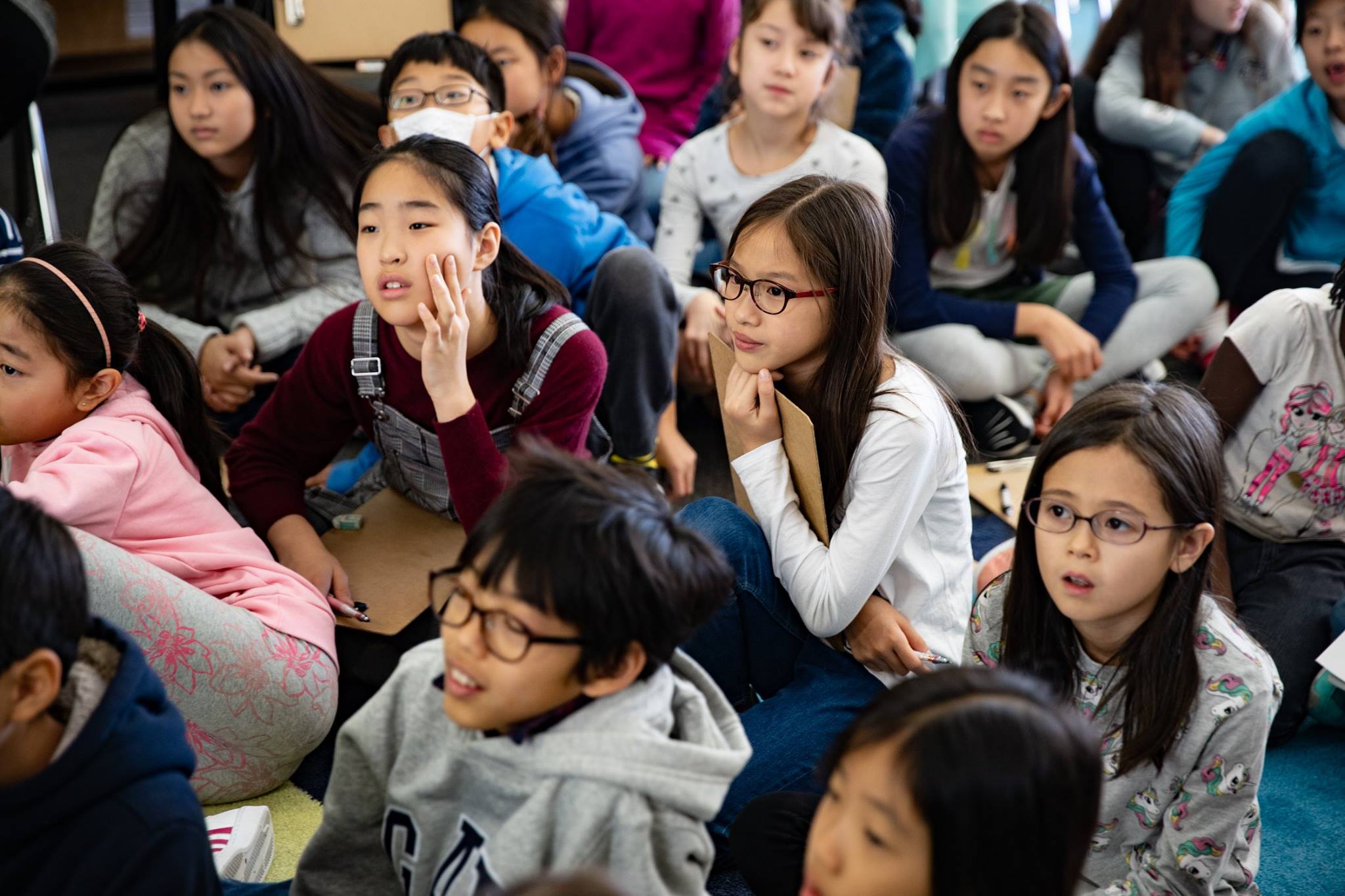 Group of students attentively listening