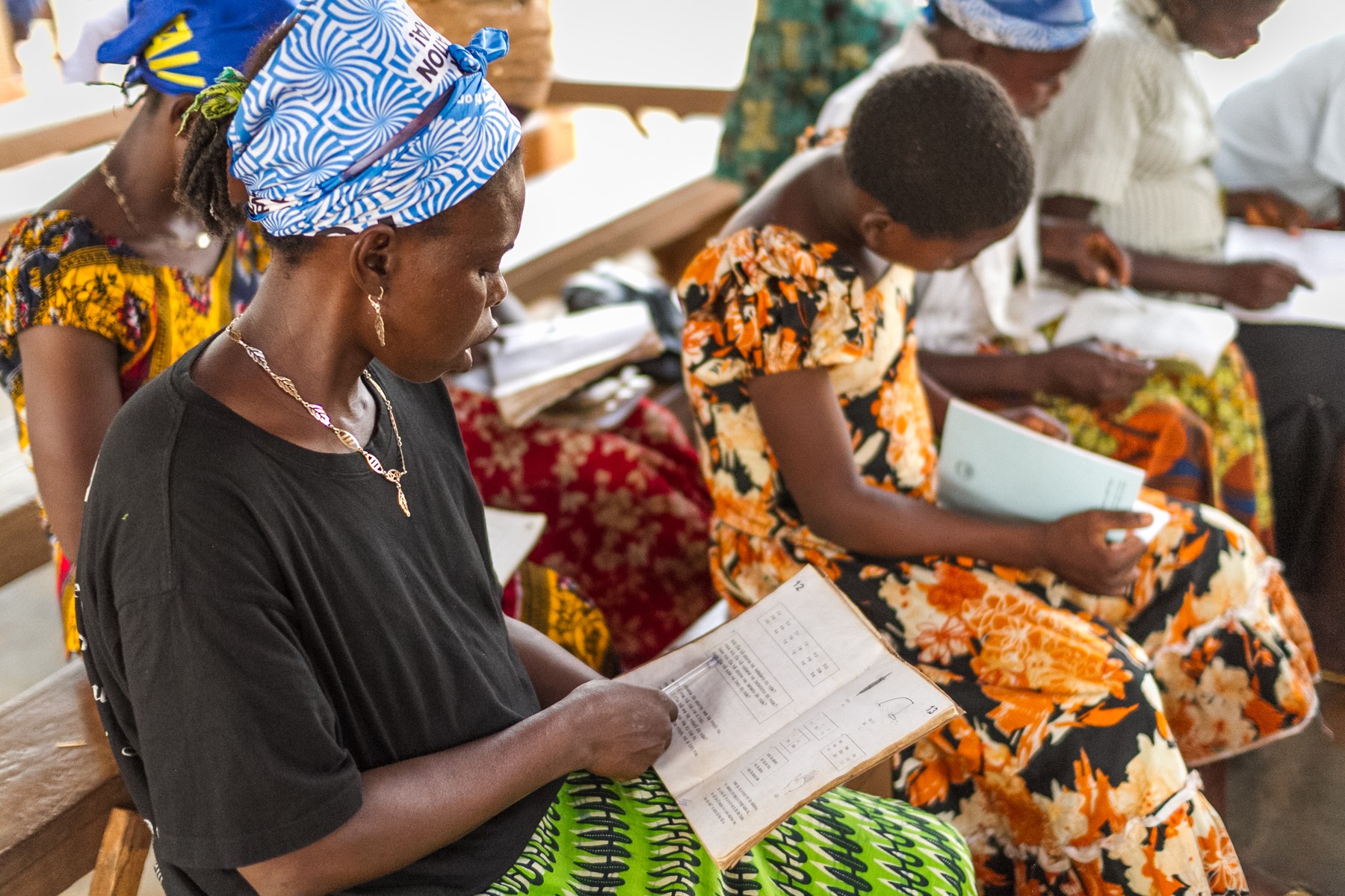 A group of women study Scripture