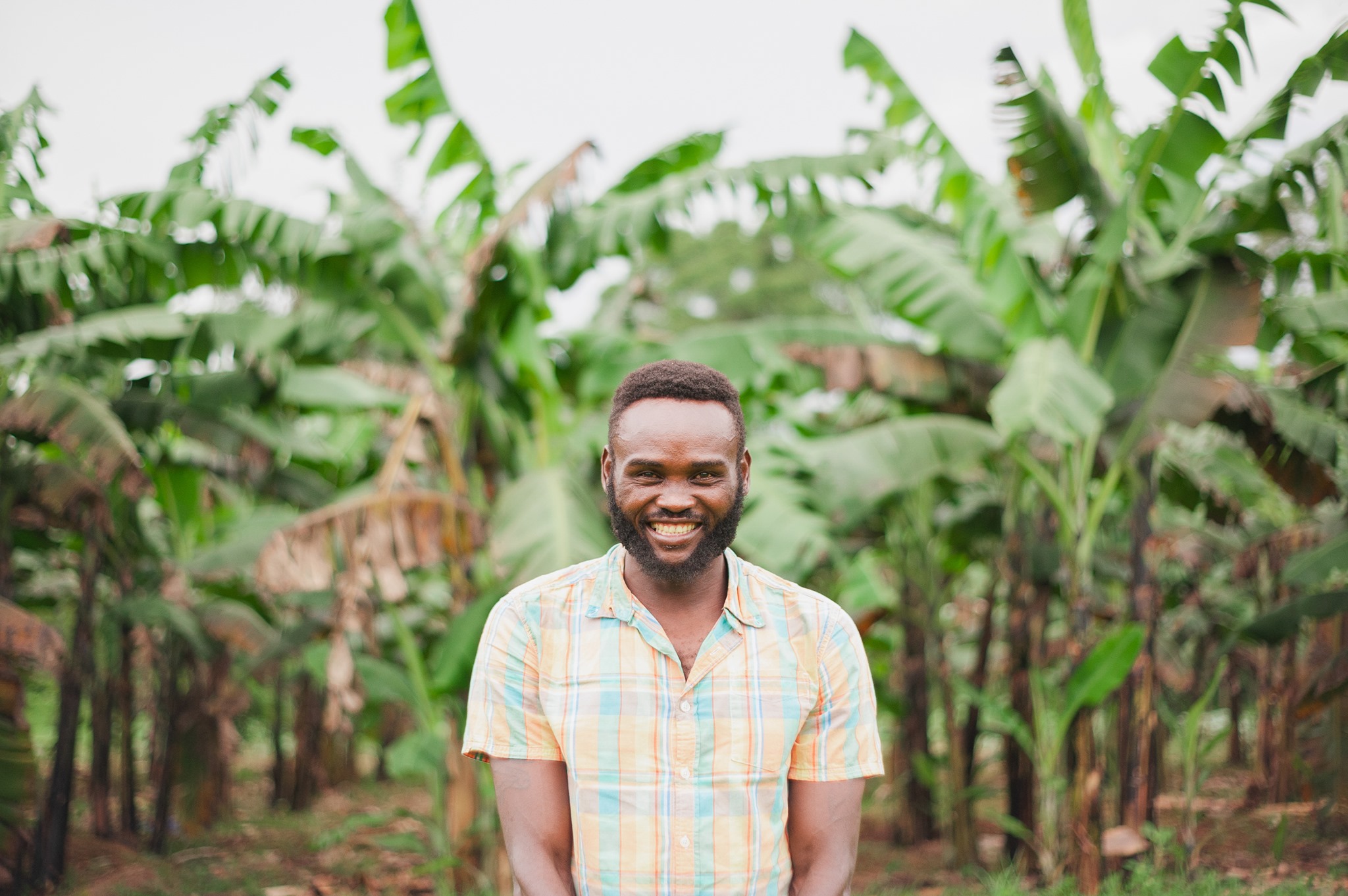 Man smiling in field