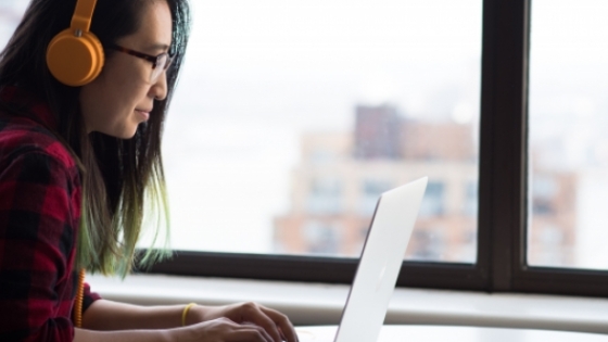 woman sitting with laptop