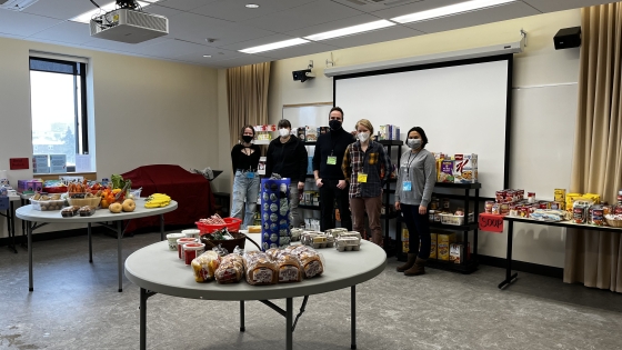 Campus Minister Brian Bork and a group of volunteers at The Distro