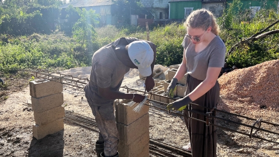 Volunteers from North America work side-by-side with Haitians in the Dominican Republic to construct a church building