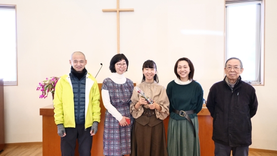 Mina and her family at her baptism