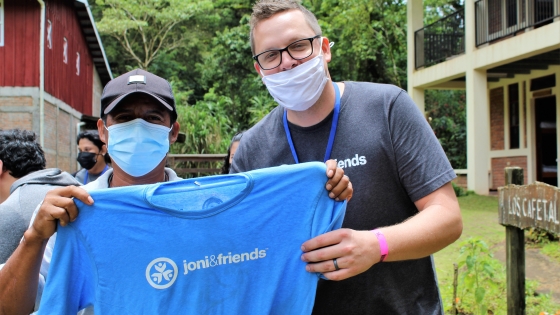 Resonate missionary Vinnie Adams gives Jorge a shirt