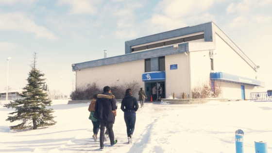 People walking into a church building