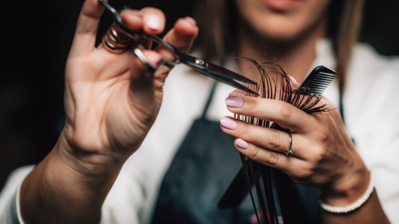 A woman cutting hair