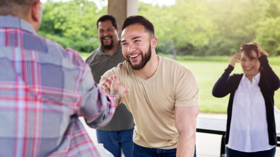 Man shaking hands with a neighbor