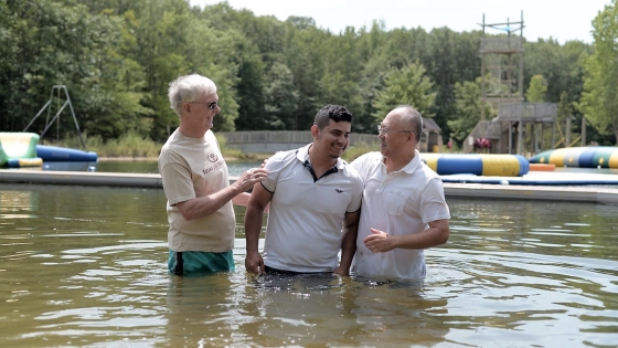 Pablo Lee and Scott Geurink baptize a member of Pablo's church plant