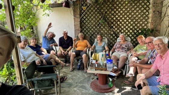 A group sits on a patio