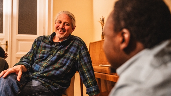 Resonate missionary Jeff Bouman smiles while talking to someone