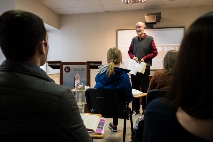 man teaching class