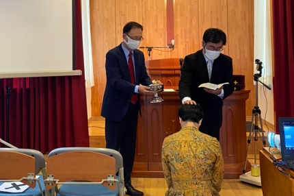 Mrs. Noguchi is baptized