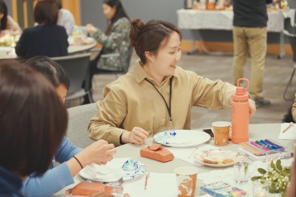 Woman working on a clay art project