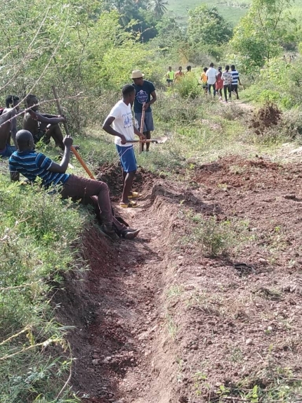 IMPACT Club students build a cistern