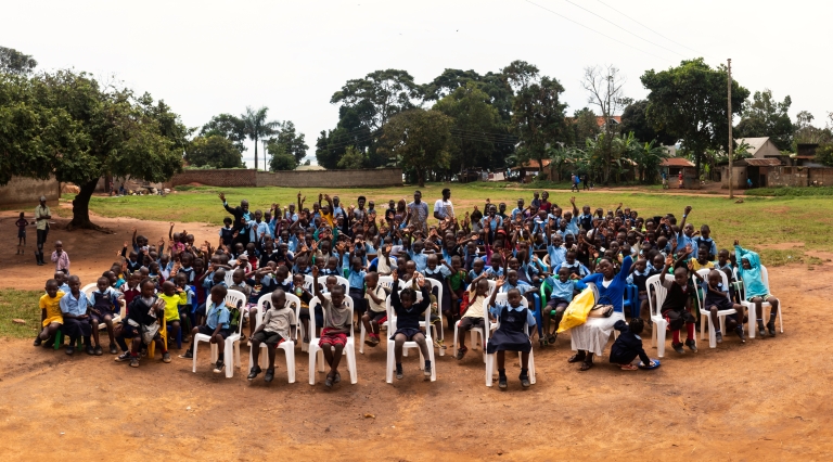 Educational Care Training in Uganda Children sit in a schoolyard