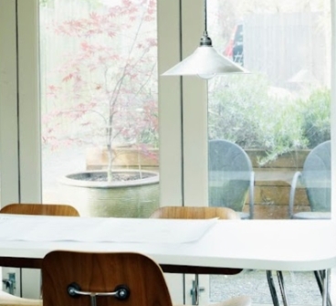 Image of an office with light coming through windows