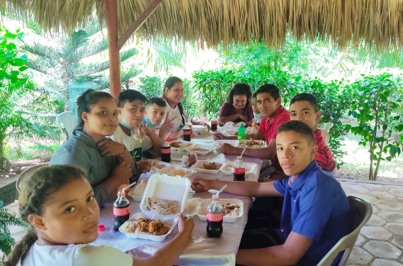 IMPACT Club Nicaragua Patricia and other members of IMPACT enjoy dinner together