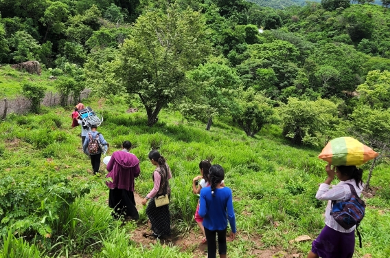One Their Way Resonate missionary Jairo Solano and members of the church travel to Maria's home
