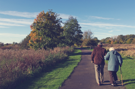 A couple walking down a path