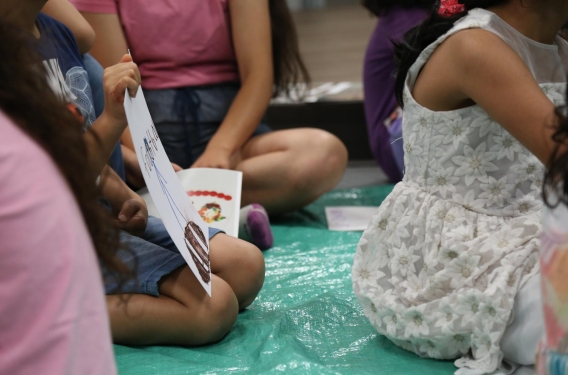 Children sitting together on the floor