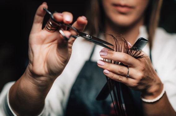 A woman cutting hair