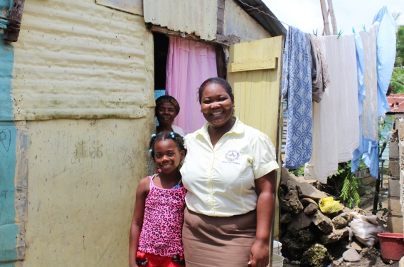 Alejandra visiting a student at her home